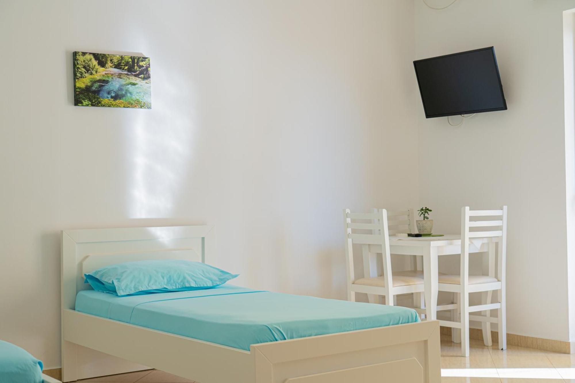 Konomi * Sarandë